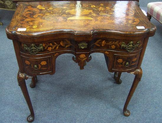 Appraisal: A Dutch walnut marquetry kneehole card table the top inlaid