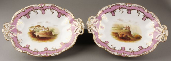 Appraisal: Pair of hand painted serving dishes both feature central motif