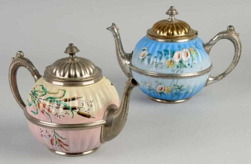 Appraisal: Lot of Melon-Shaped Graniteware Teapots Description Includes one shaded blue