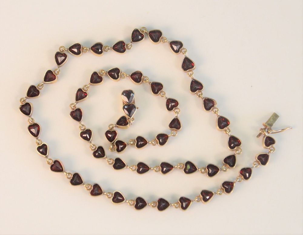 Appraisal: Gold Necklace set with heart shaped garnets length inches total