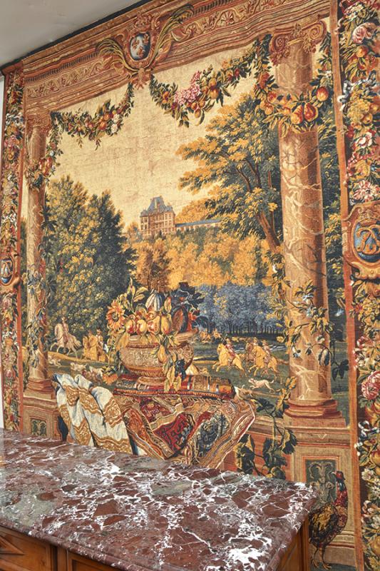 Appraisal: A PRINTED TH CENTURY STYLE TAPESTRY depicting a hunting scene