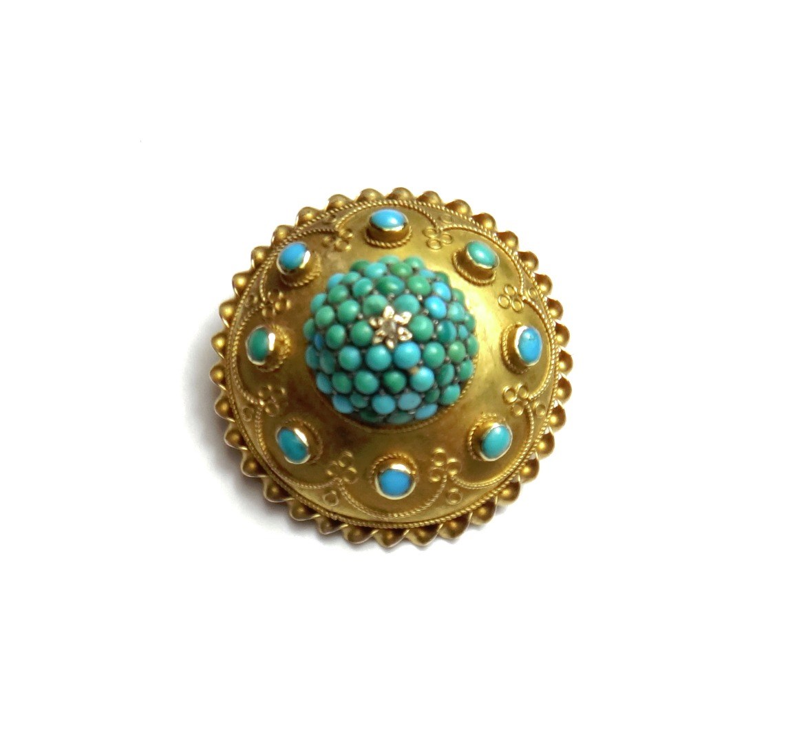 Appraisal: A Victorian gold and turquoise set brooch of circular target