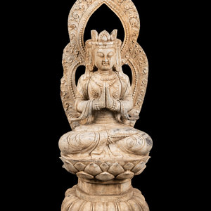 Appraisal: A Chinese Carved Stone Seated Guanyin Figure Height x width