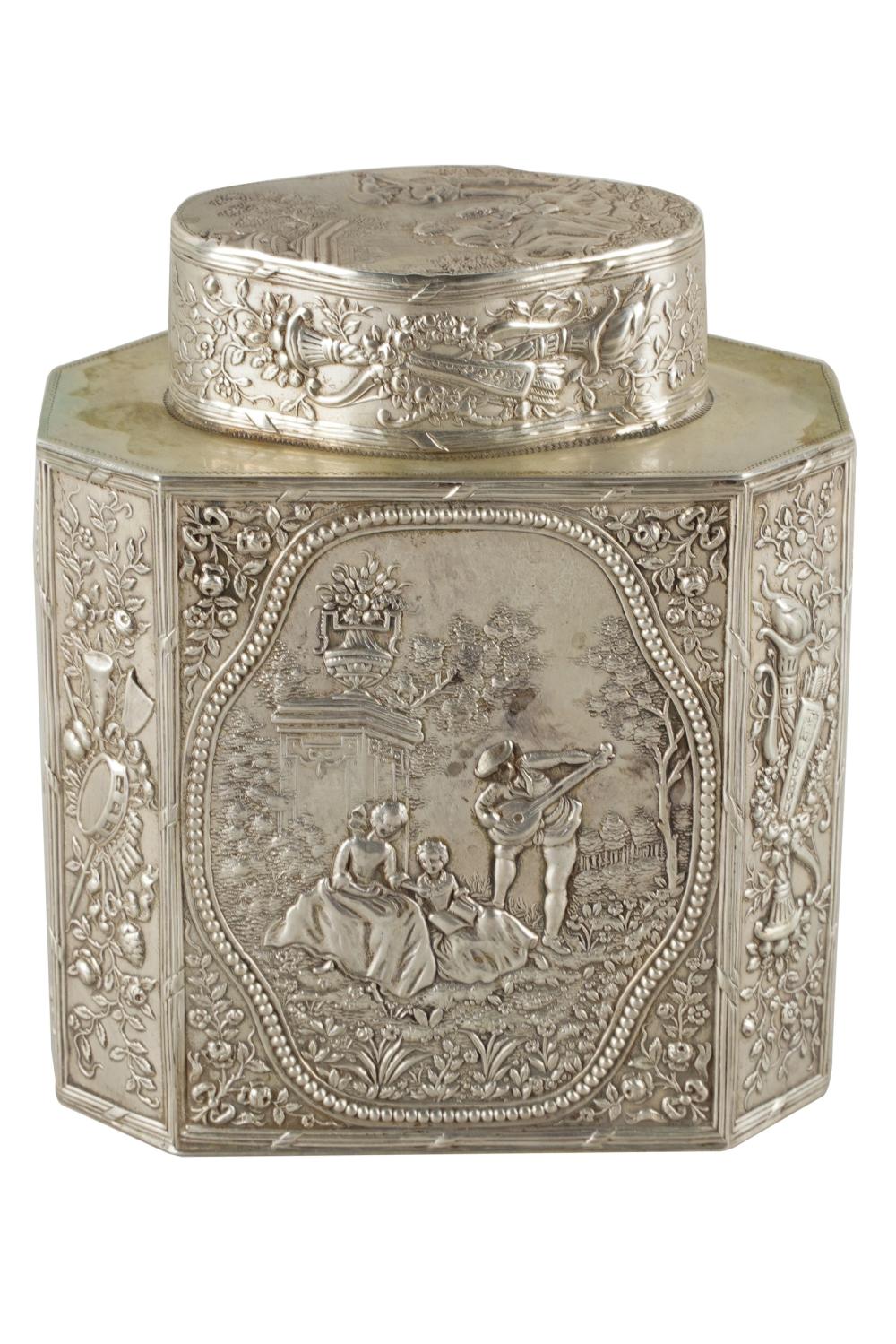 Appraisal: SILVER REPOUSSE TEA CADDYafter with national control mark and further