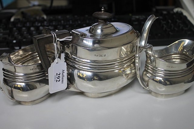 Appraisal: A SILVER TEA SET of baluster form with reeded bodies