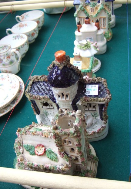 Appraisal: A group of Staffordshire pastille burners and others similar