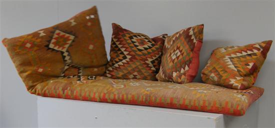 Appraisal: Large Kelim design cushion and three smaller similar cushions PROVENANCE