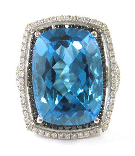 Appraisal: BLUE TOPAZ DIAMOND AND WHITE GOLD RING The k white