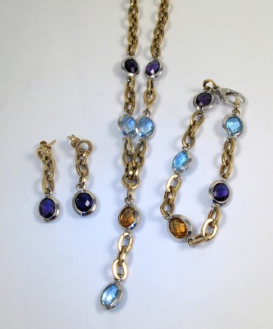 Appraisal: FOUR PIECE JEWELRY SET including a blue topaz amethyst and