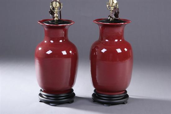 Appraisal: PAIR CHINESE COPPER RED PORCELAIN VASES Electrified - in high