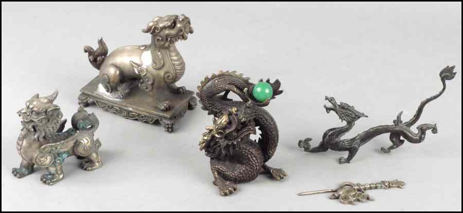 Appraisal: PATINATED BRONZE DRAGON Holding a green jade ball Together with