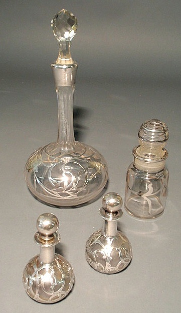 Appraisal: Four silver overlay bottles and decanters Decanter h