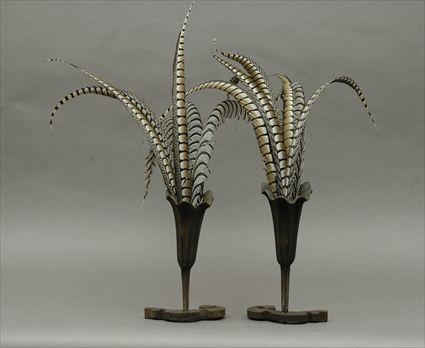 Appraisal: Pair of Cast-Iron Vases with Feathers