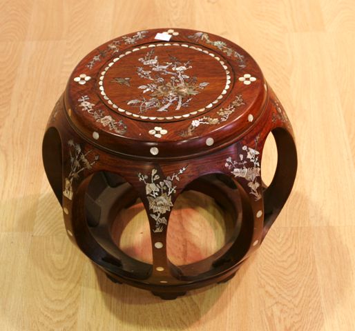 Appraisal: A Chinese barrel shaped stool with mother of pearl inlaid