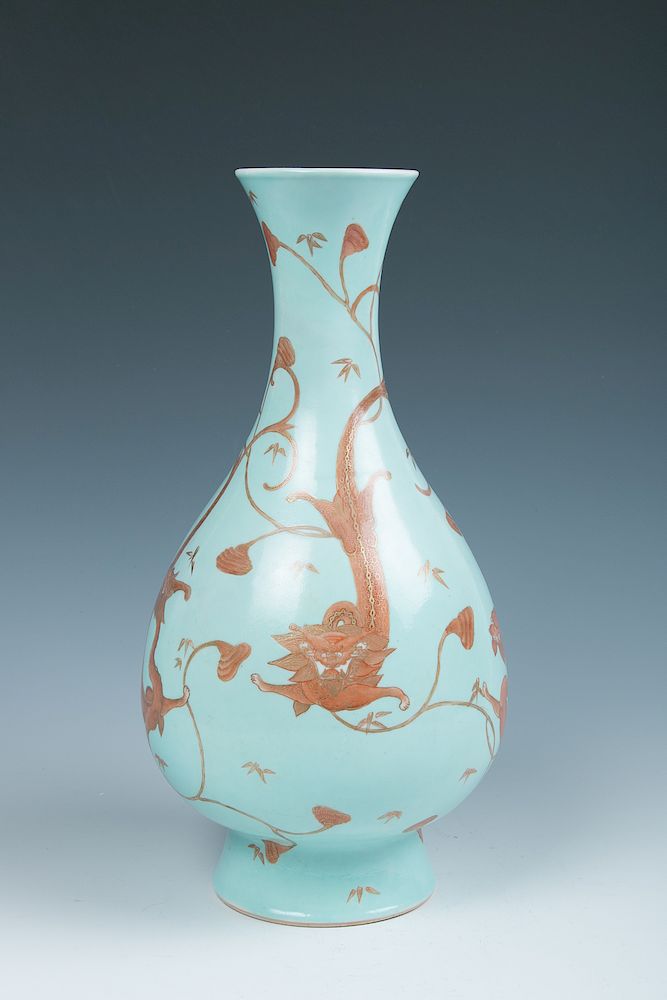 Appraisal: A TURQUOISE-GROUND GILT IRON-RED 'DRAGON' VASE The vase of pear