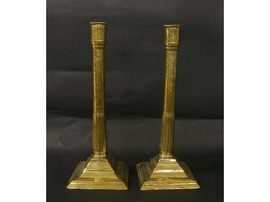 Appraisal: Pair of late th century seamed brass neoclassical candlesticks with