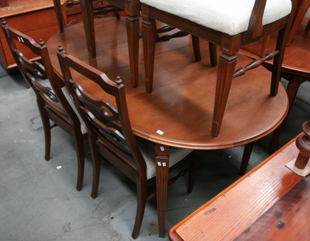 Appraisal: An oak extension dining table th century ensuite with next