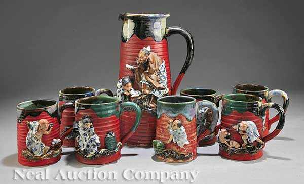 Appraisal: A Japanese Sumida Ware Figural Pitcher and Seven Mugs early