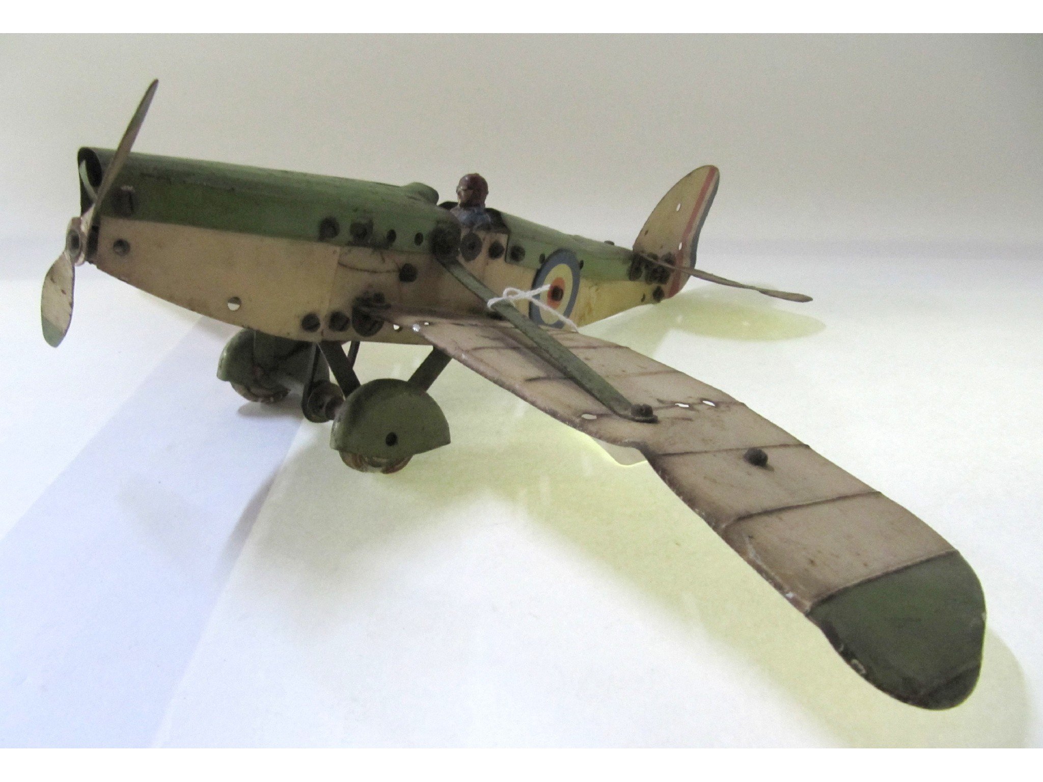 Appraisal: A tinplate model aeroplane