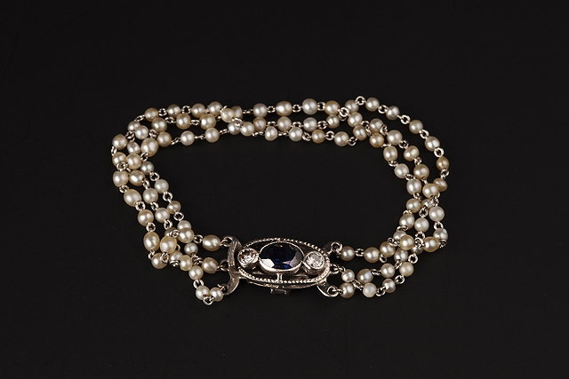 Appraisal: A SEED PEARL BRACELET WITH SAPPHIRE AND DIAMOND SET CLASP