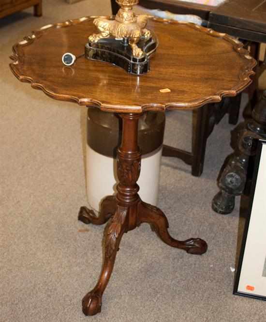 Appraisal: Chippendale style mahogany tilt-top tea table Estimate - No condition