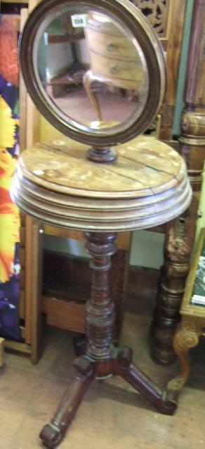 Appraisal: A Victorian mahogany gentleman's wash stand the circular bevelled mirror