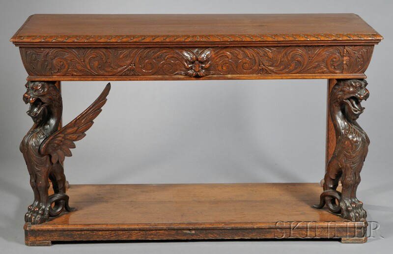 Appraisal: Renaissance Revival Carved Oak Console Table th century top with