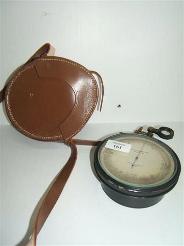 Appraisal: A COMPENSATING SURVEYING ANEROID BAROMETER by Hall Parding Ltd No