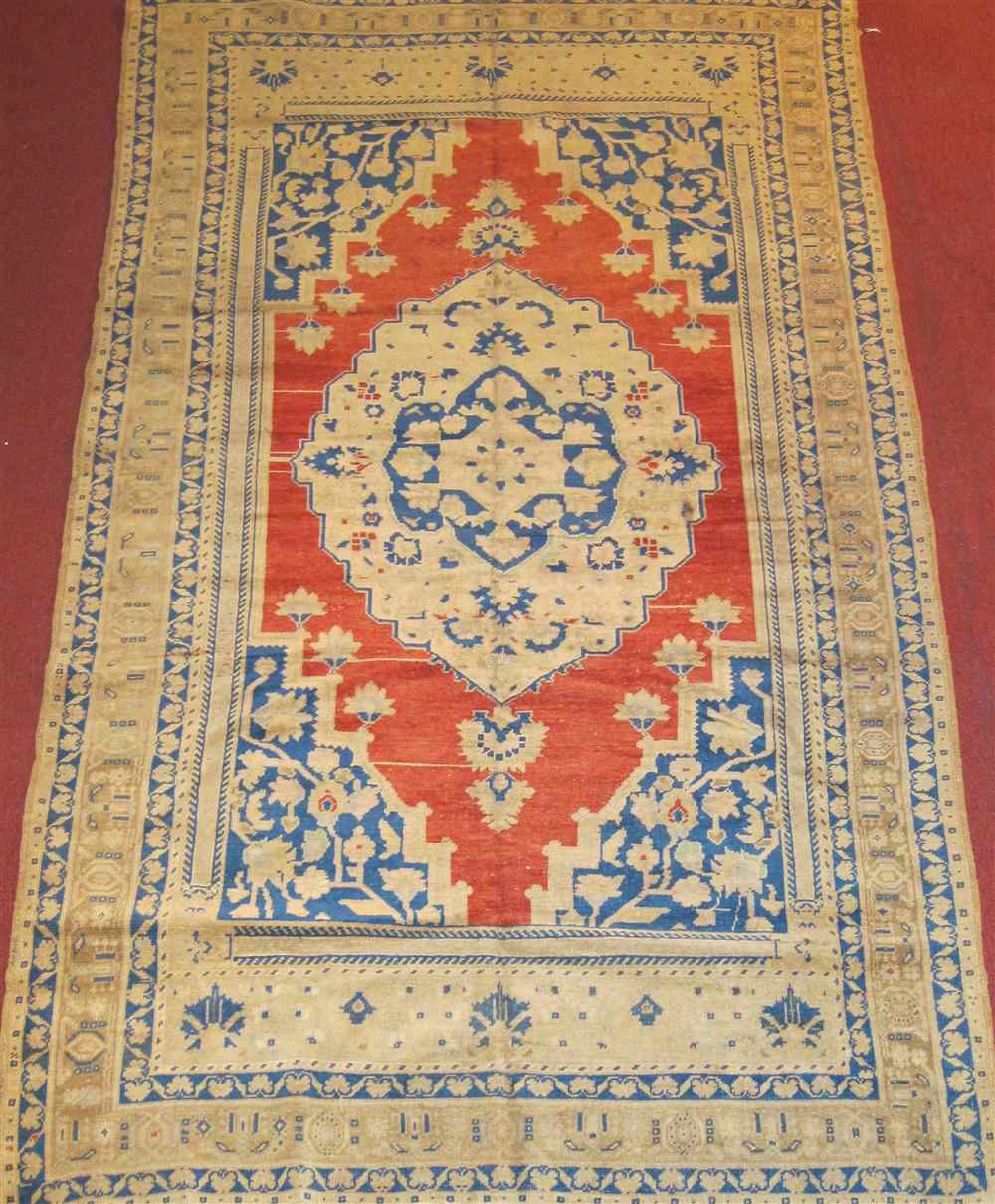 Appraisal: OUSHAK RUG approx ' x ' '' retail tag Provenance