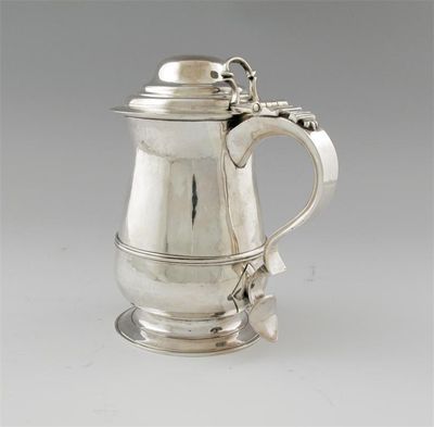 Appraisal: A George III baluster tankard with a spreading foot applied