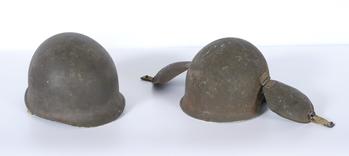 Appraisal: US WWII ARMY HELMETS To include Fixed bale M helmet