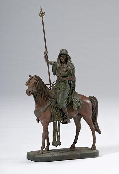 Appraisal: WHITE METAL STATUE OF MOUNTED ARAB WITH SPEAR in shades