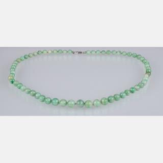 Appraisal: A Graduated Green Jade Beaded Necklace Having jade beads measuring