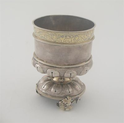 Appraisal: A late th century German parcel gilt beaker in the