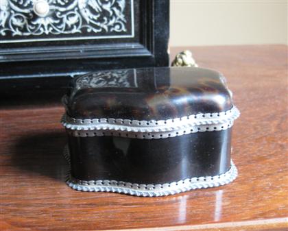 Appraisal: Asprey silver mounted tortoiseshell serpentine trinket boxengland early th century