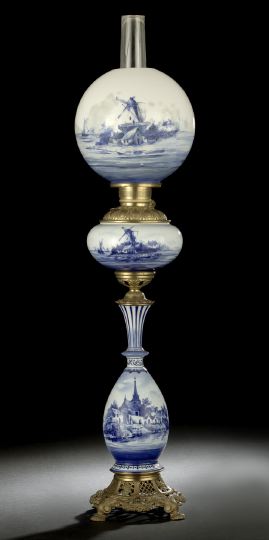 Appraisal: Gilt-Brass-Mounted Delft Pottery Kerosene Parlor Lamp fourth quarter th century