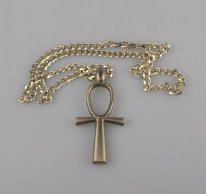 Appraisal: Silver curb chain having grey metal ankh attached