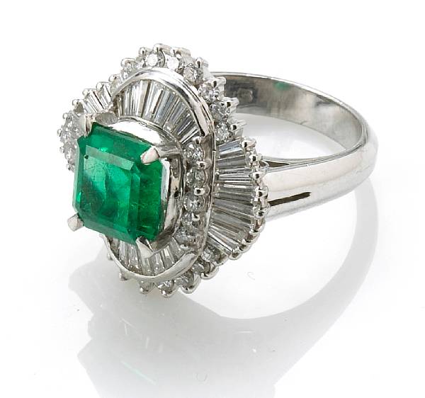 Appraisal: An emerald and diamond ring centering a square-cut emerald weighing