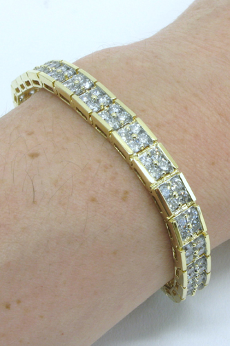 Appraisal: DIAMOND AND KARAT GOLD BRACELET in length and set with