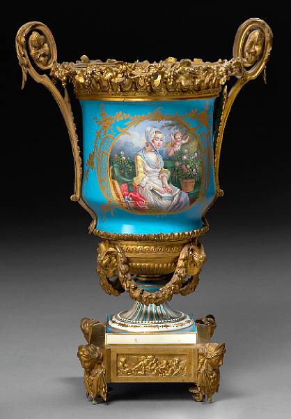 Appraisal: A Sevres style gilt bronze mounted porcelain urn late th