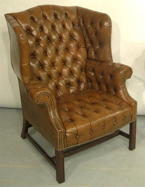 Appraisal: Drexel Heritage wing chair brown leather upholstery button tufted with