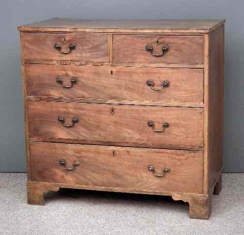 Appraisal: A George III mahogany chest of drawers with later crossbanded