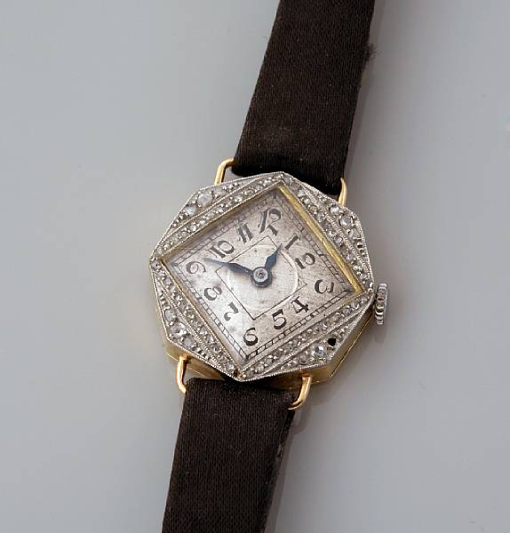 Appraisal: An octagonal K gold and diamond lady's wristwatch Mechanical movement