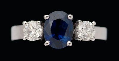 Appraisal: Sapphire diamond ring central oval blue sapphire estimated weight cts