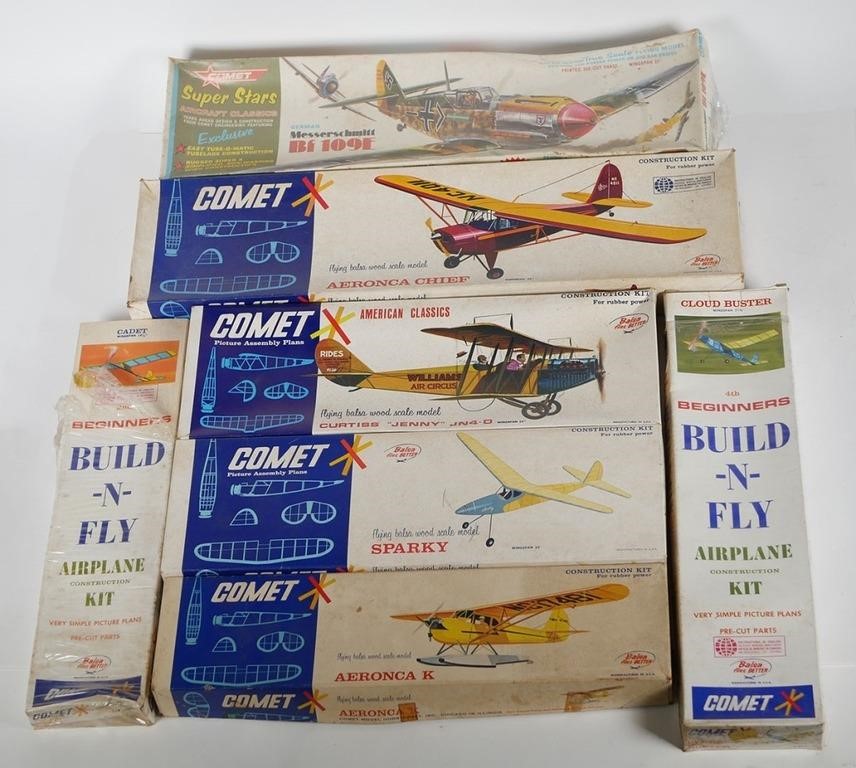 Appraisal: VINTAGE COMET MODEL AIRPLANE KITSSeven balsa wood model airplane build