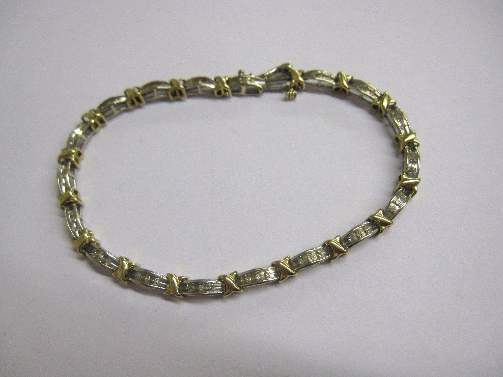 Appraisal: Nine carat gold diamond line bracelet