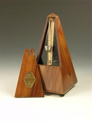 Appraisal: A French mahogany cased Metronome with applied Maelzel embossed plaque