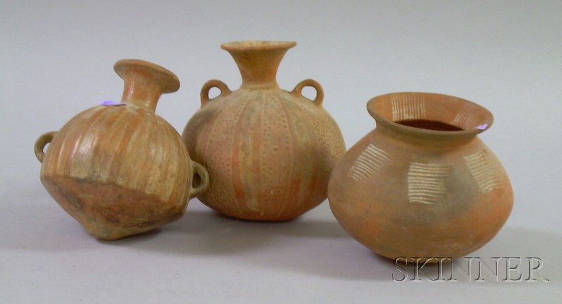 Appraisal: Three Pre-Columbian Pots a double-handled pot with ribbed sides a