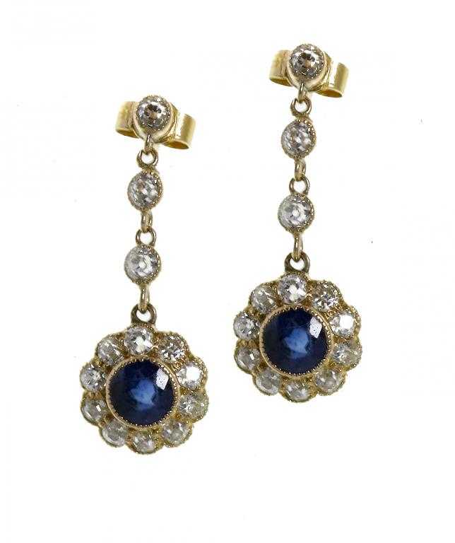 Appraisal: A PAIR OF SAPPHIRE AND DIAMOND EARRINGS the cluster suspended