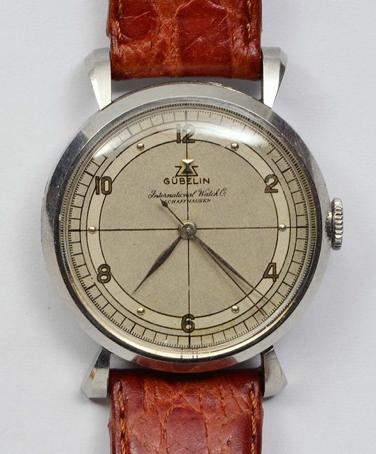 Appraisal: A GUBELIN STEEL CASED WRIST WATCH the silvered dial with